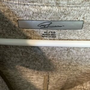 Greg Norman zippered nocturnal neck super soft hemmed at the wrist and bottom​​